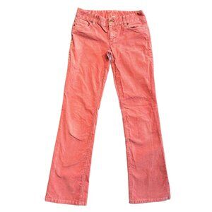 Add a pop of color to your wardrobe with these vibrant coral pink corduroy pants